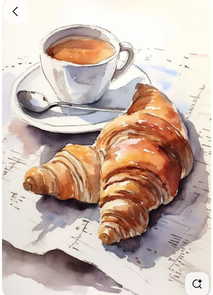 Café et croissant sur une table